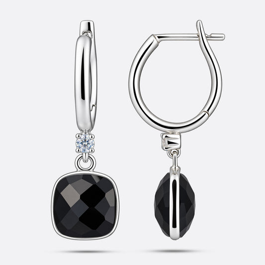 Front and side views of the silver drop hoop earrings, showing the black garnet's faceted face and the depth of its setting.