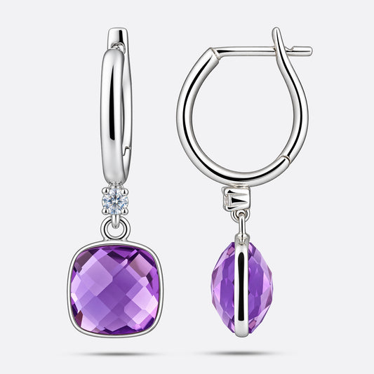 Two violet amethyst drop earrings shown from the front and side, revealing the depth of the stone and the silver bezel setting.
