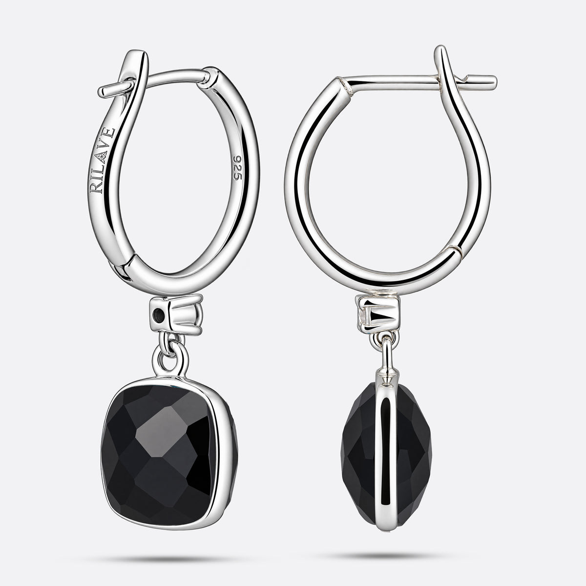 Rear and side views of the earrings, showing the RILAVE and 925 engravings inside one hoop and the black garnet in profile.