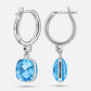 Reverse and side views of the sterling silver earrings, showing the RILAVE engraving, 925 stamp and gemstone settings.