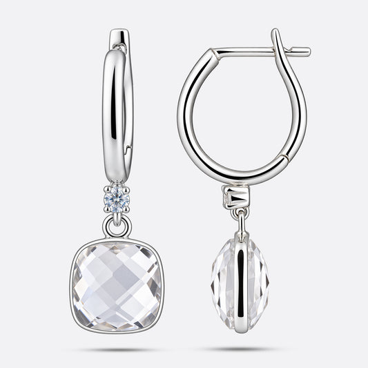 Pair of White Topaz drop earrings in sterling silver, displaying the front faceted cut and the structured side profile setting.