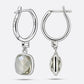 Rear and side views of RILAVE Green Amethyst drop hoop earrings, showing the hinged clasps, brand engraving and 925 mark.