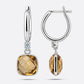 Front and side views of Olive Quartz drop hoop earrings, showing the faceted gemstone, silver setting and open hinged hoop.