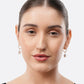 Front-facing model wearing matching silver drop hoop earrings, each finished with a pale, cushion-shaped Rainbow Moonstone.